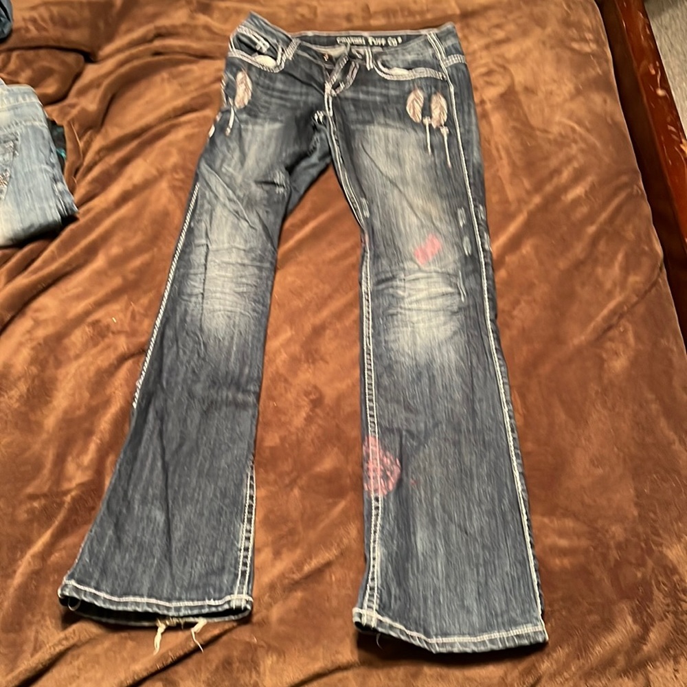 Cowgirl Tuff- Fly W-27 L-35 Lots of weird stains and some ware on the bottom.
